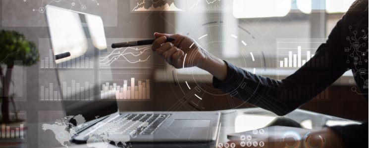 An image of a hand over a laptop. Technology, Media & Telecoms Sector. Cloud accounting programs banner