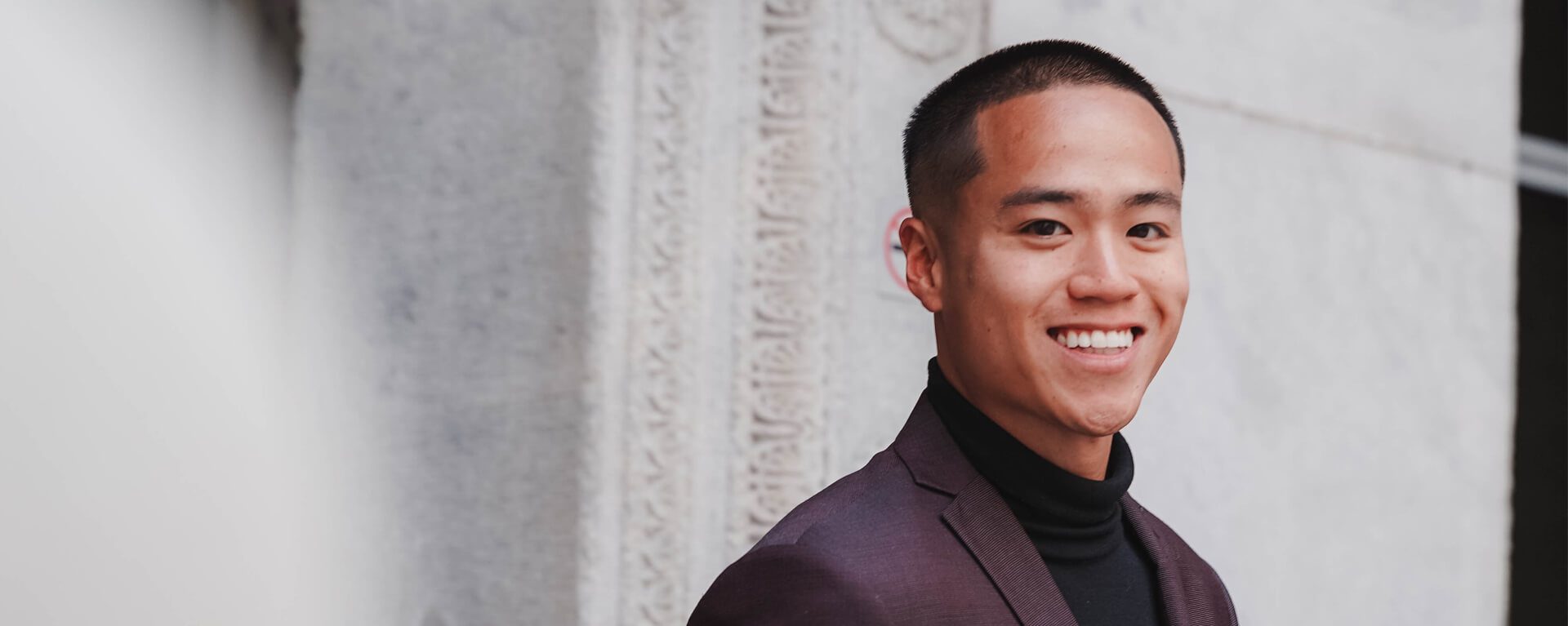 New Business Set Up Services banner showing a man smiling in an open area