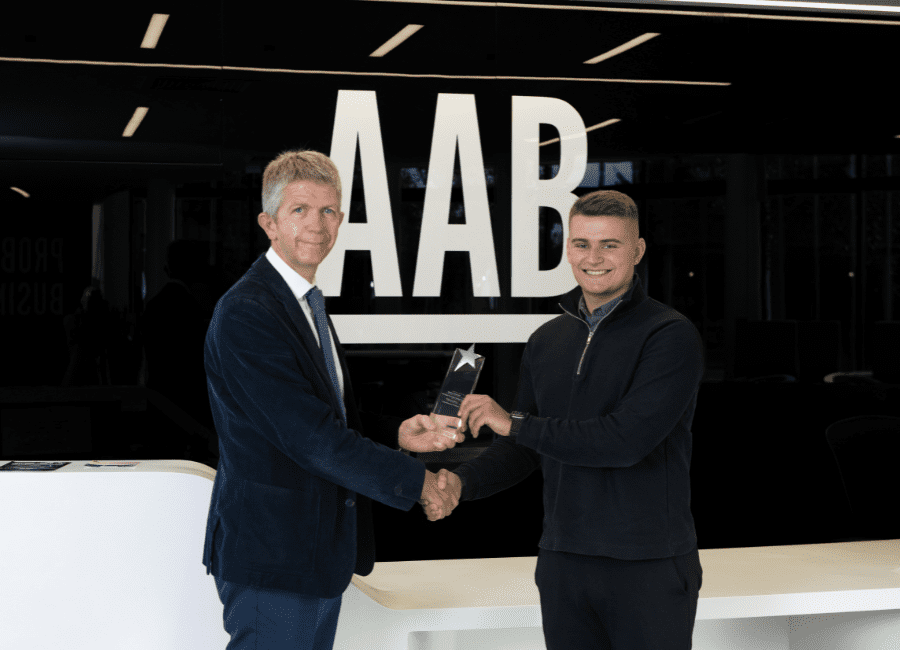 Derek Mair, Audit Partner presenting RGU Best Final Year Student Accounting and Finance Award to Matthew Buckham