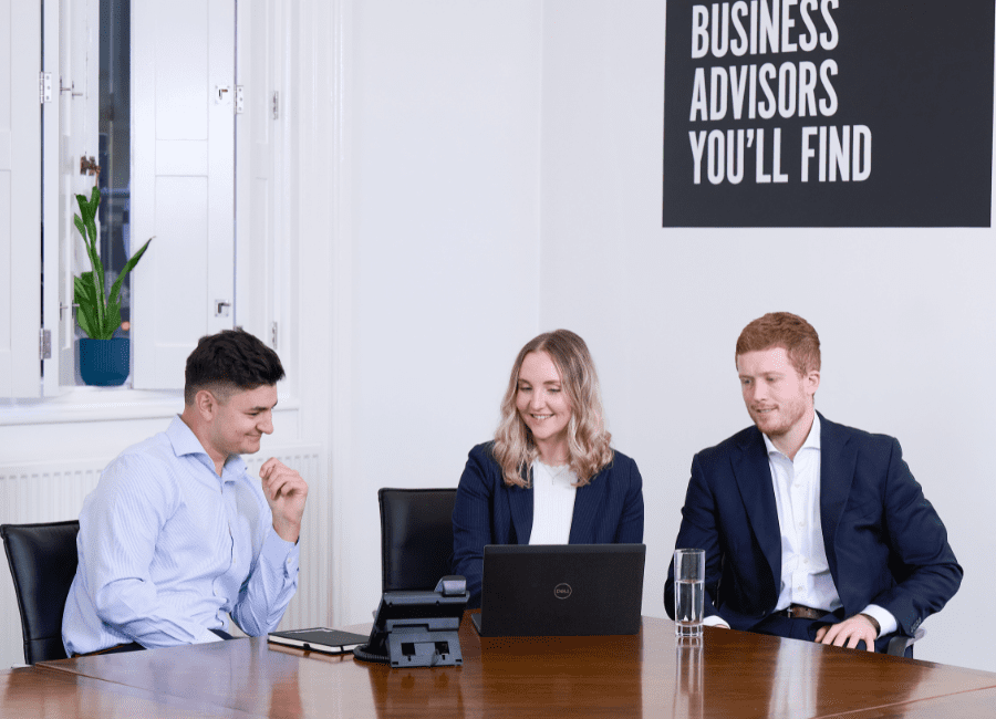 Image of AAB team members having a meeting about tax for private client services