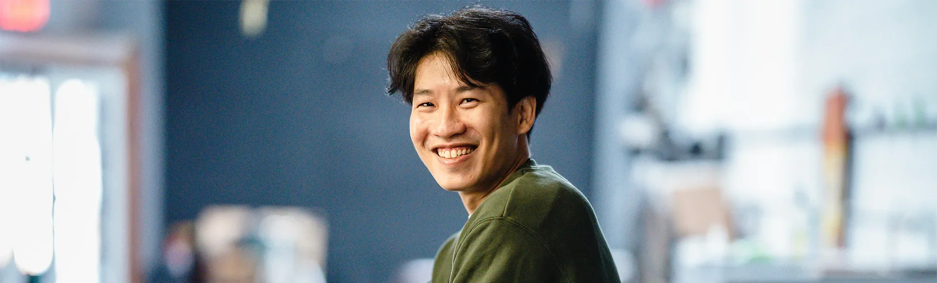 Man smiling at camera.